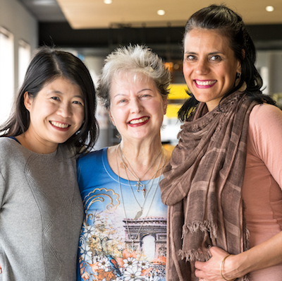 Three women of different ages and ethnic backgrounds
