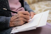 An older lady writing
