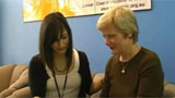 A cancer nurse discusses a booklet