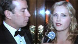 David Cotter interviews a guest at Tuxedo Junction Ball