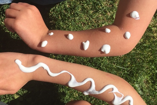 Arms showing dots of sunscreen
