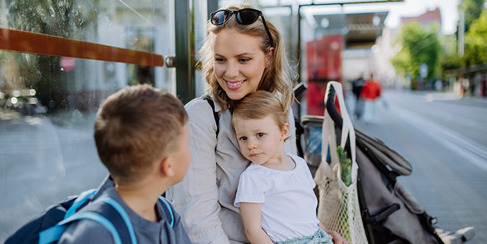Mother daughter working at dining table