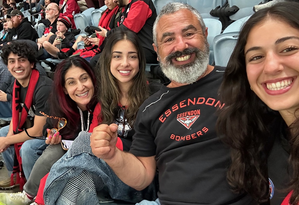 Paul and family at a football match